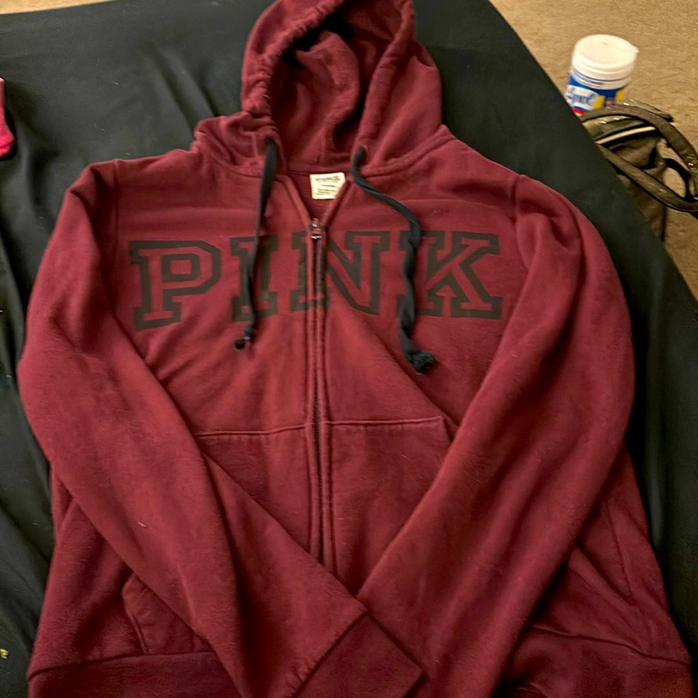 Pink/Victoria secrete. Size medium barely worn. No stains or rips,zipper works.